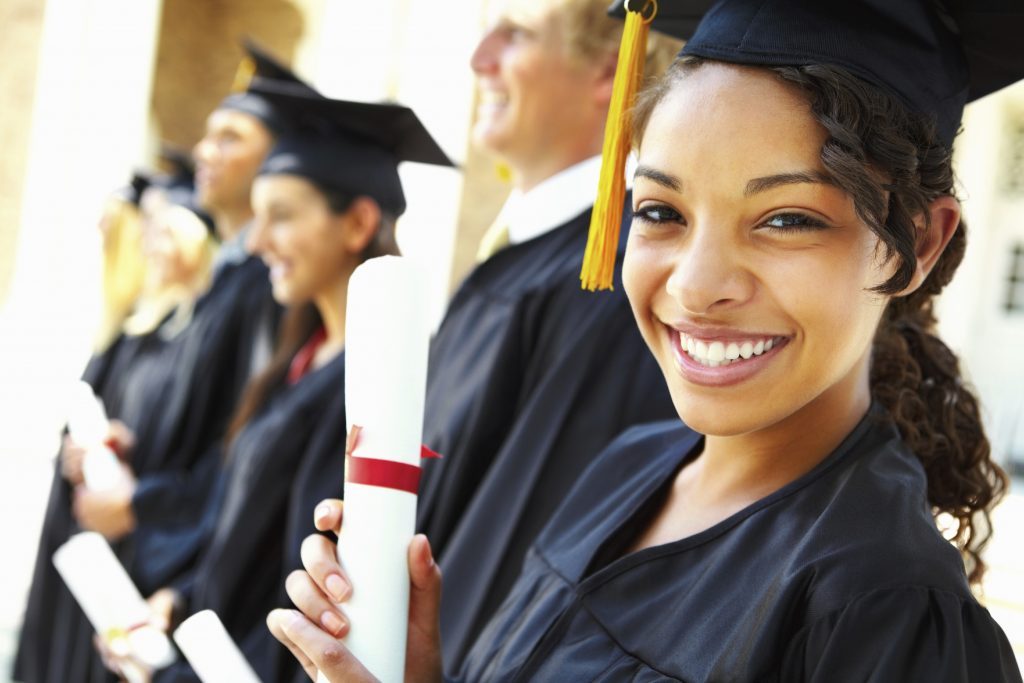 Image of student smiling at graduation